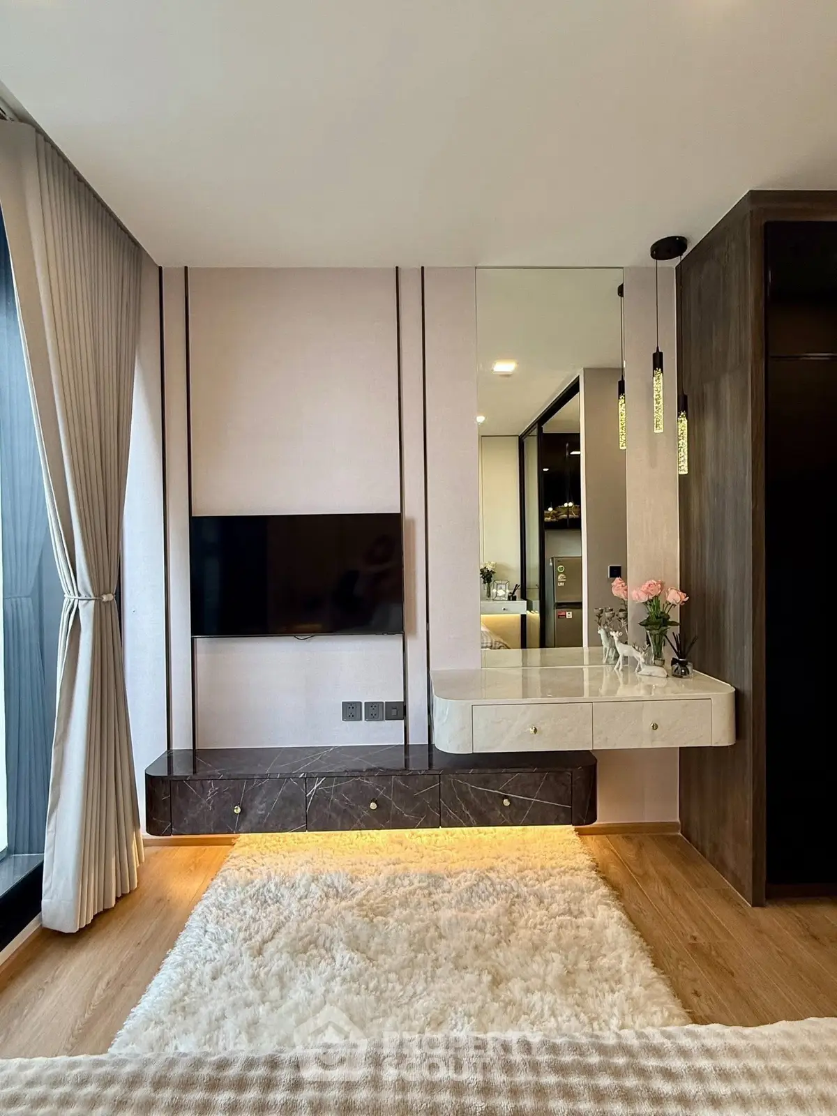 Luxurious modern living room with elegant decor and large window view