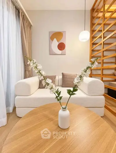 Stylish living room with modern decor and cozy seating area