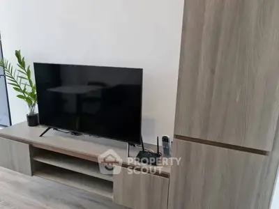 Modern living room with sleek TV stand and minimalist decor
