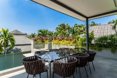 Luxurious outdoor dining area with stunning garden view and modern furniture