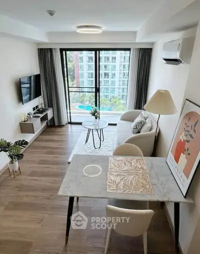 Modern living room with balcony view in a stylish apartment