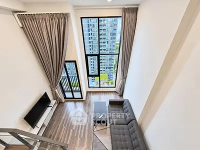 Modern high-rise apartment with floor-to-ceiling windows and stylish interior design.