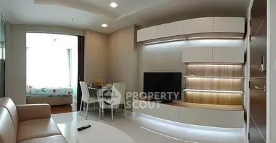 Modern living room with sleek furniture and ambient lighting