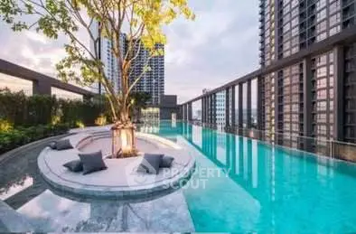 Luxurious rooftop pool with stunning cityscape views and modern design.