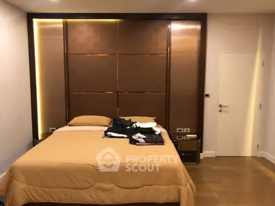 Luxurious bedroom with modern design and elegant lighting
