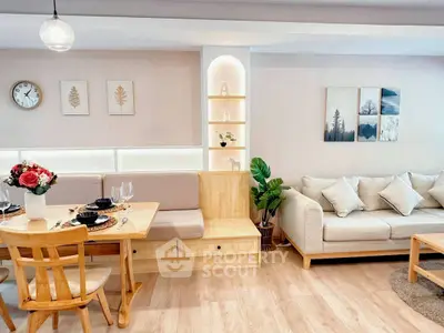 Modern living room with elegant decor and cozy seating area