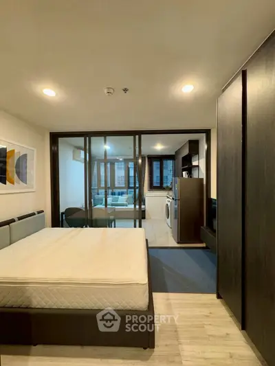 Modern studio apartment with open layout and stylish furnishings