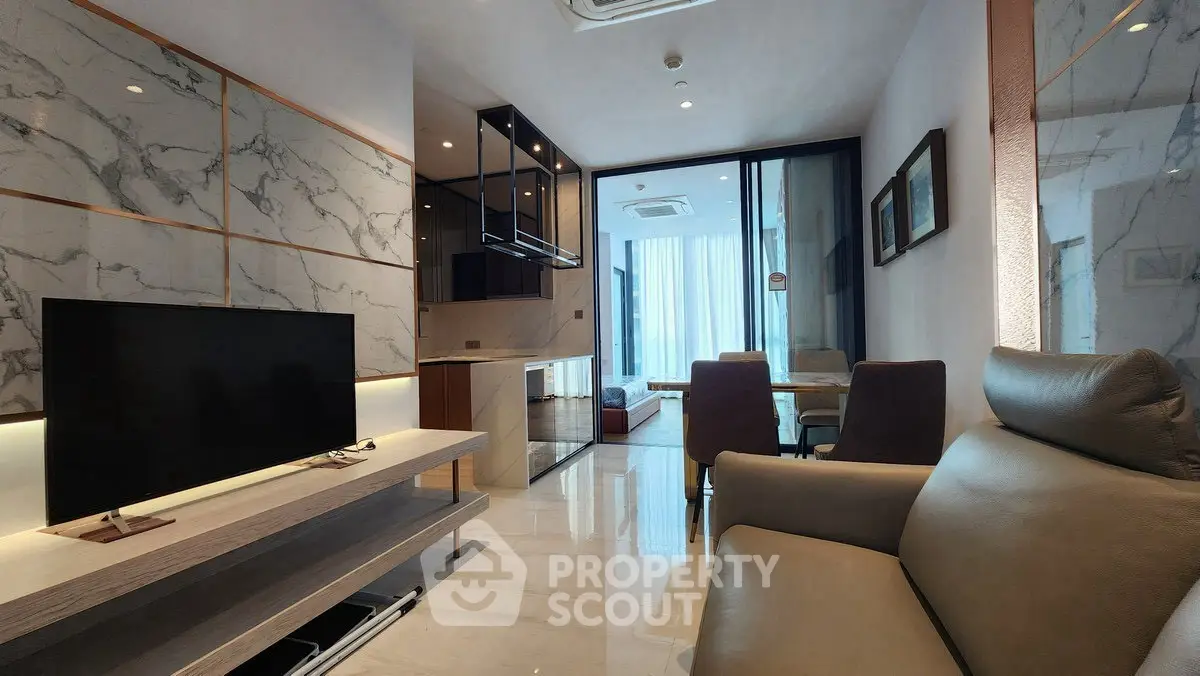 Modern living room with marble accents and sleek furniture