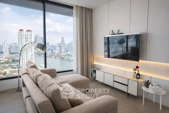 Luxurious living room with stunning city skyline view, modern decor, and elegant furnishings.