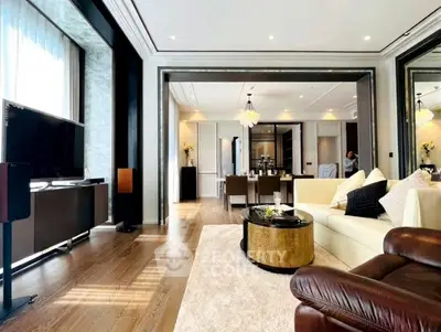 Luxurious open-plan living room with elegant decor and spacious layout