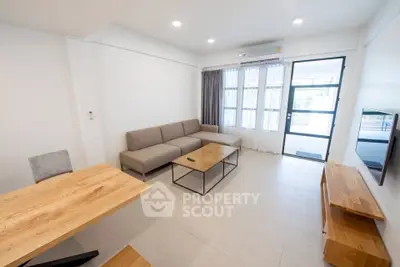 Modern living room with sleek furniture and natural light