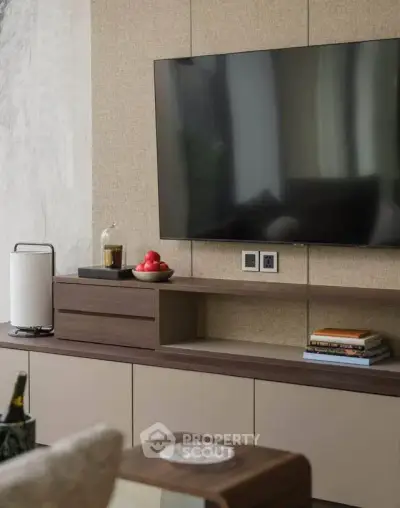 Modern living room with sleek TV setup and stylish decor