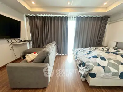 Cozy bedroom with modern decor and natural light