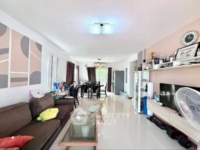 Spacious modern living room with elegant decor and ample natural light