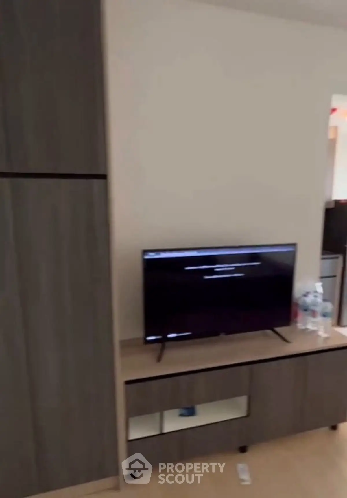 Modern living room with sleek TV stand and minimalist decor