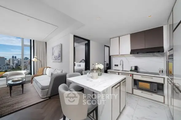 Luxurious open-plan living room and kitchen with city view, modern furnishings, and elegant decor.