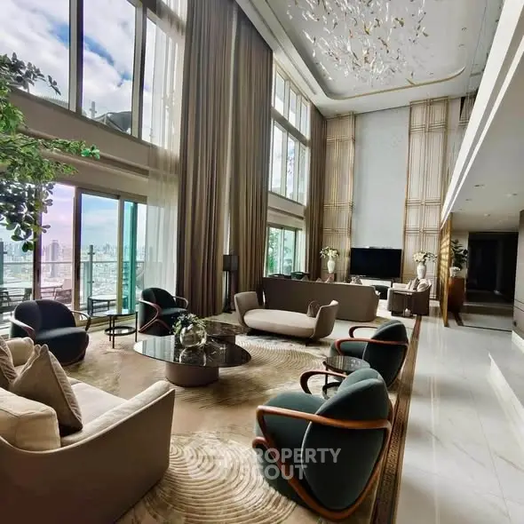 Luxurious high-ceiling living room with panoramic city views and elegant decor