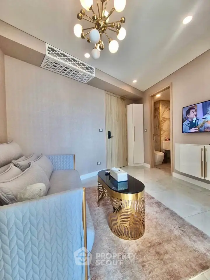 Luxurious living room with elegant decor and modern lighting