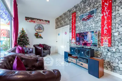 Festive living room with Christmas decor and modern entertainment setup