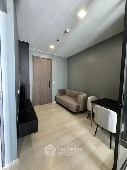 Modern living room with sleek furniture and minimalist design