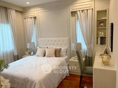 Elegant bedroom with plush bedding and stylish decor