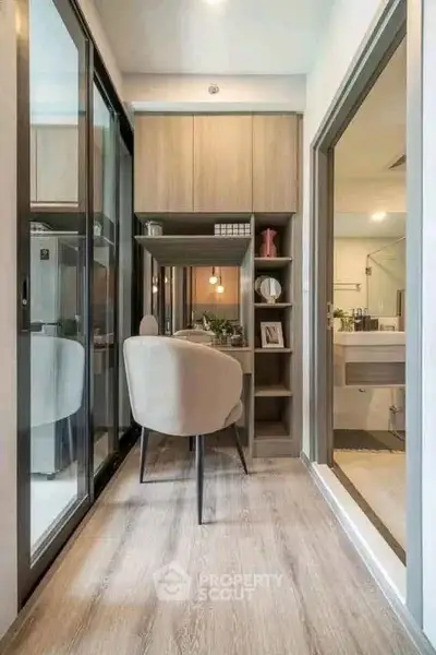 Modern study nook with sleek design and ample storage in a contemporary apartment.