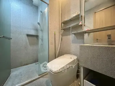 Modern bathroom with sleek design and glass shower enclosure