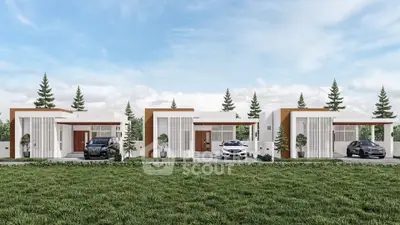 Modern minimalist villas with sleek design and lush green surroundings, showcasing luxury living in a serene environment.