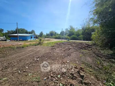 Spacious land plot with potential for development in a serene rural setting.