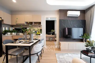 Modern open-plan living and dining area with stylish decor and natural light