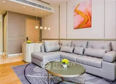 Modern living room with stylish decor and comfortable seating in a contemporary apartment.