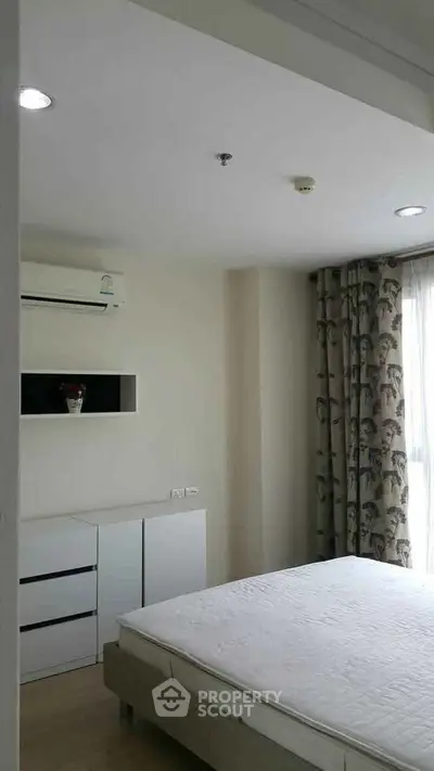 Modern bedroom with minimalist design and natural light