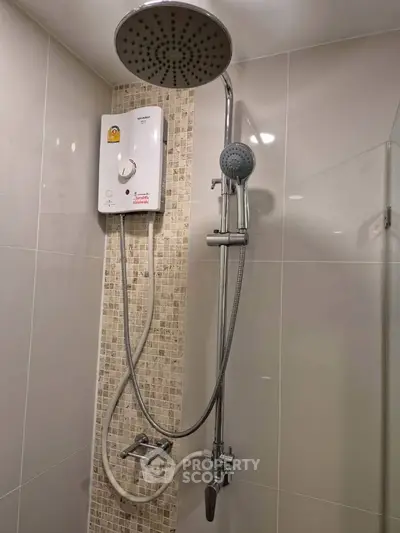 Modern bathroom shower with sleek design and water heater installation.