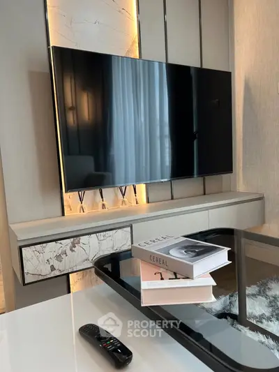 Modern living room with sleek TV setup and stylish decor