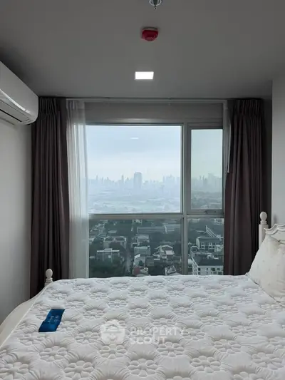 Stunning bedroom with panoramic city view and elegant decor