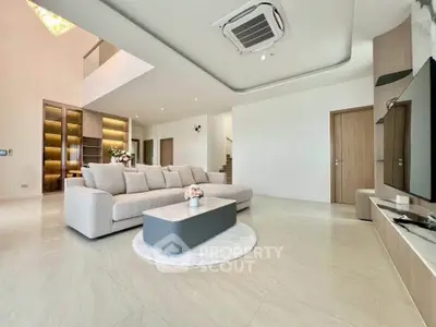 Spacious modern living room with elegant decor and cozy seating area
