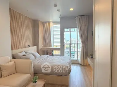 Modern bedroom with balcony view in a stylish apartment
