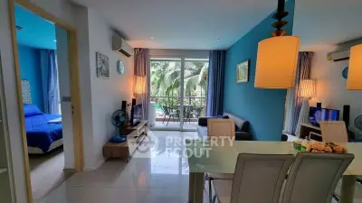 Modern living room with dining area and balcony view in a stylish apartment