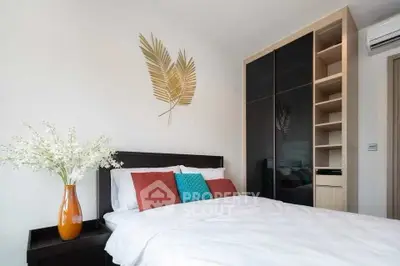 Modern bedroom with stylish decor and spacious wardrobe