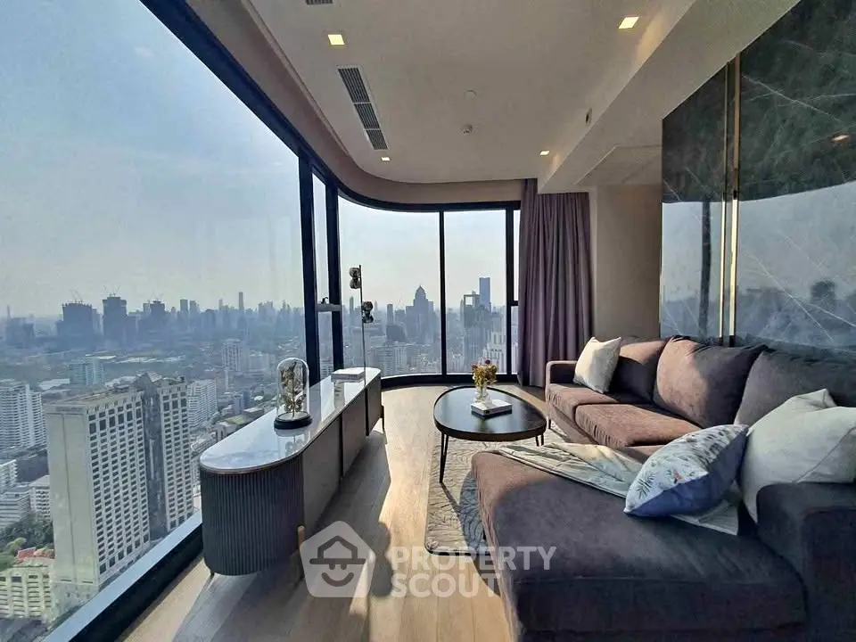 Luxurious living room with panoramic city view from high-rise apartment