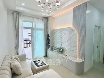 Modern living room with elegant decor and large window for natural light