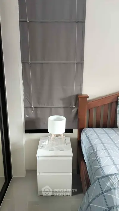 Cozy bedroom corner with modern decor and natural light