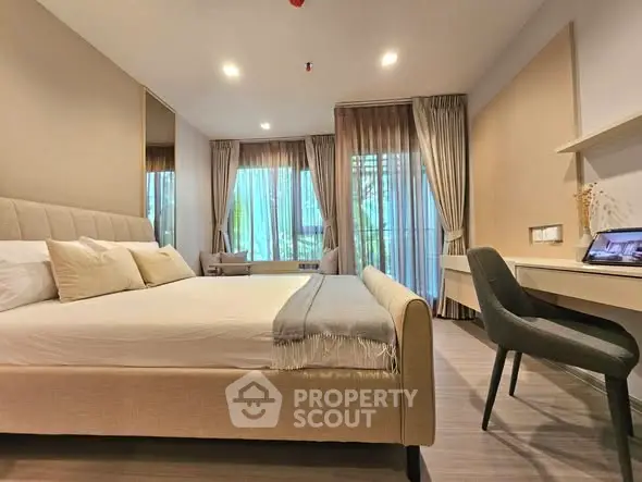 Modern bedroom with elegant decor and natural light