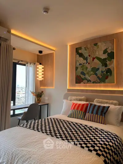 Stylish bedroom with modern decor and city view, featuring cozy bed and artistic lighting.