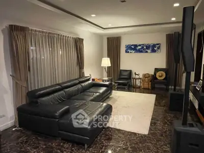 Luxurious living room with elegant leather sofa and marble flooring