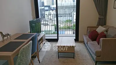 Modern living room with balcony view in urban apartment