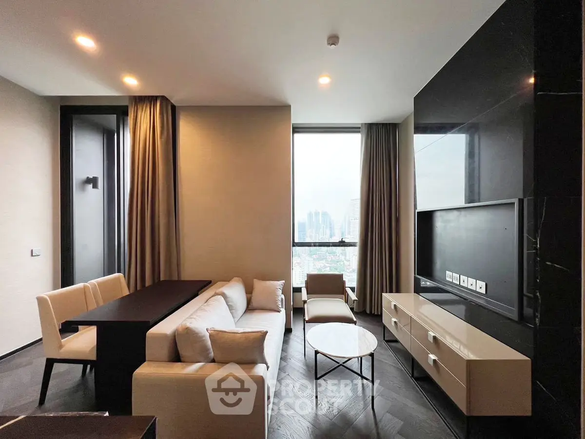 Modern living room with city view, elegant furniture, and natural lighting.