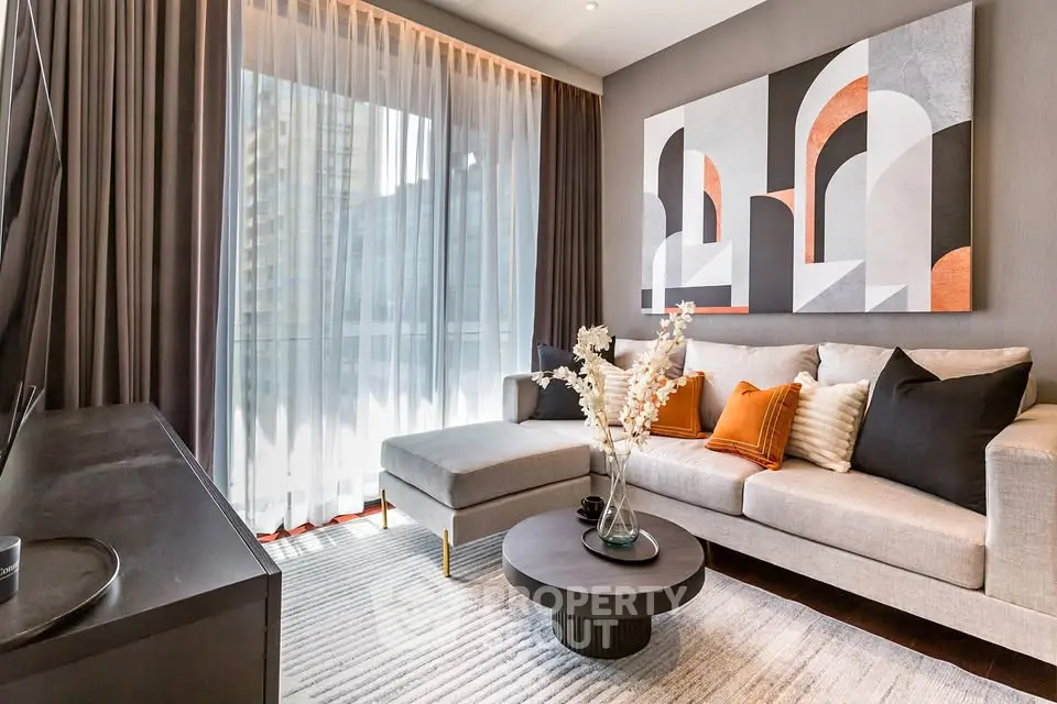 Stylish modern living room with elegant decor and large window view