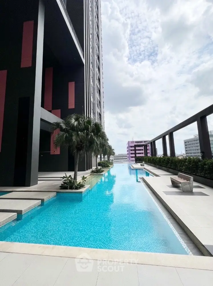 Luxurious high-rise building with stunning rooftop pool and city views