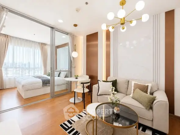 Luxurious modern living room with elegant decor and spacious bedroom view, perfect for urban living.
